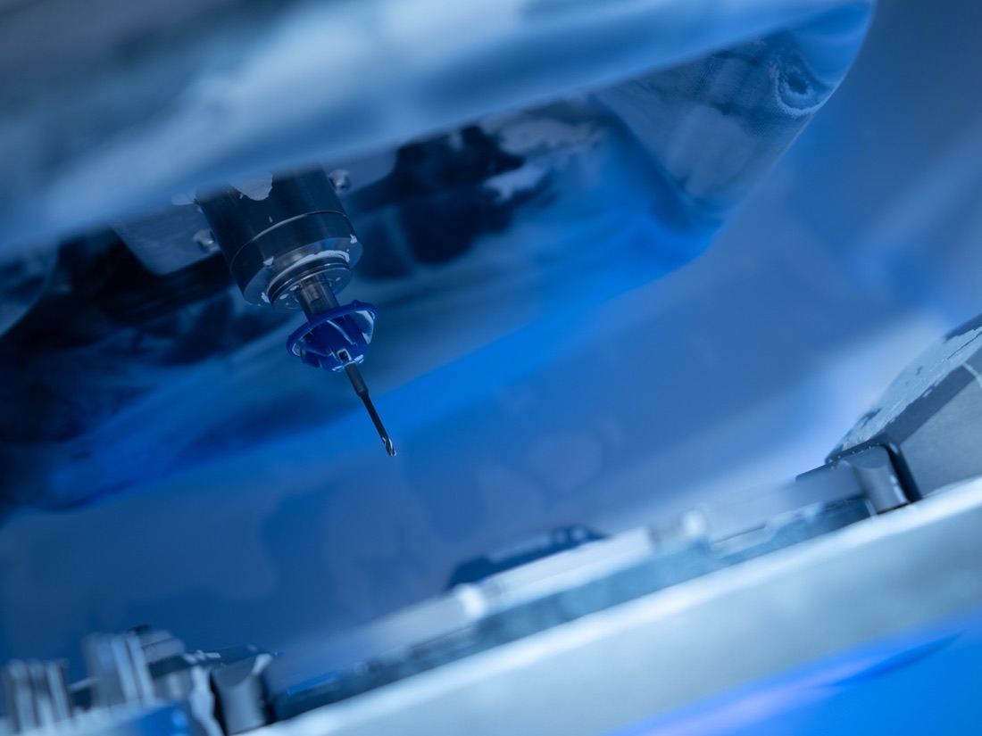 A zirconia arch being milled in our in-house lab